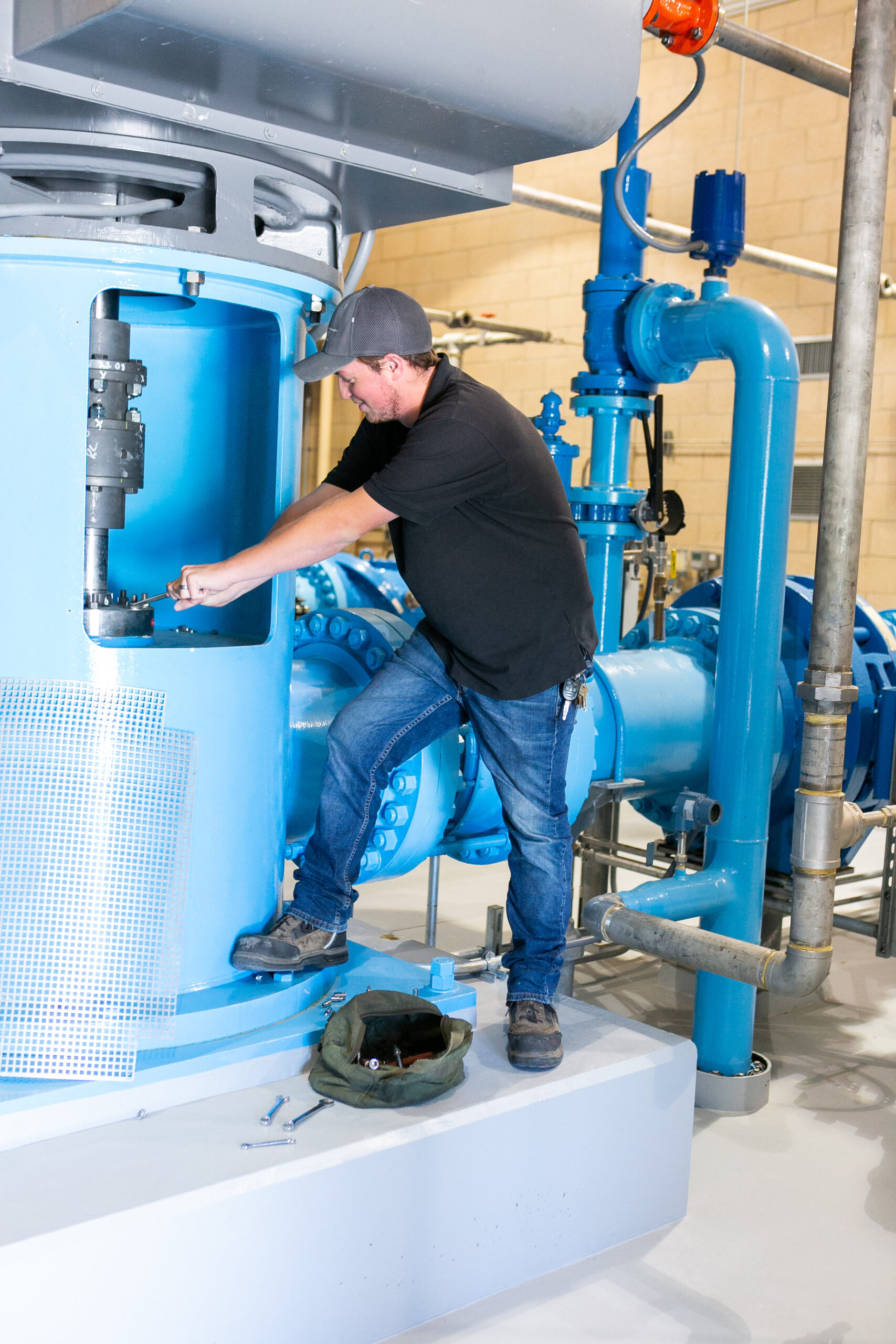 San Bernardino Valley Municipal Water District employee repairing pipe